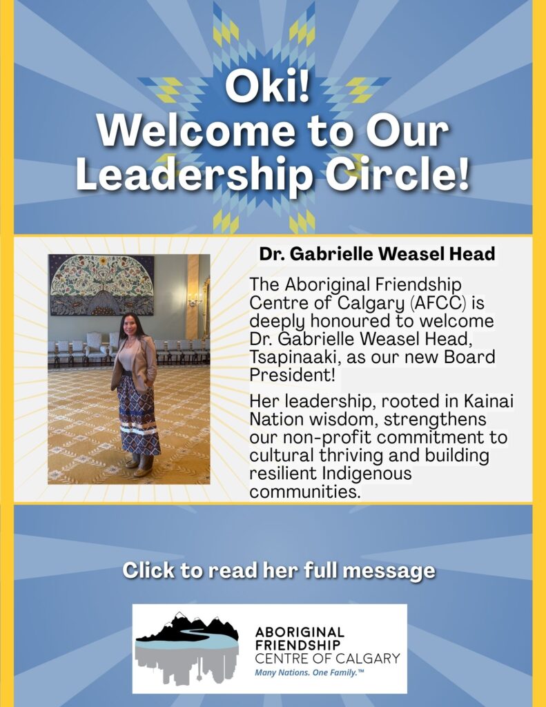 Dr. Gabrielle Weasel Head, Tsapinaaki, new AFCC Board President, standing in traditional attire in a large hall with artwork.